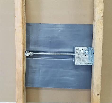 lead pads for electrical boxes|adhesive backed lead panels.